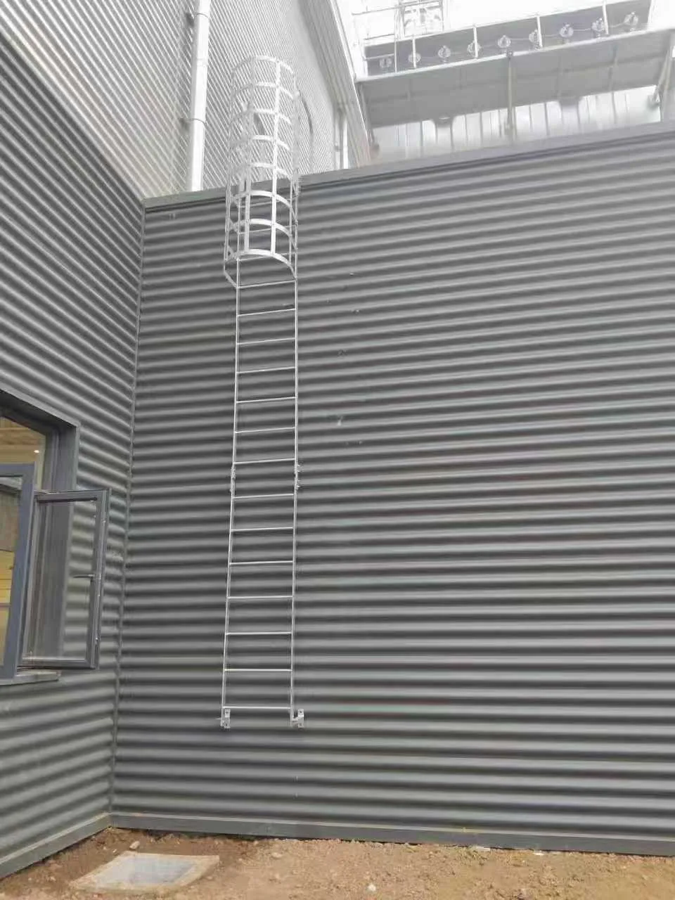 Steel fixed vertical ladder